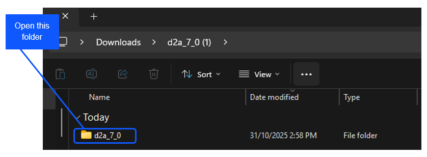 File explorer window showing a highlighted folder named "d2a_7_0" within the "Downloads" directory. A blue label reads "Open this folder."