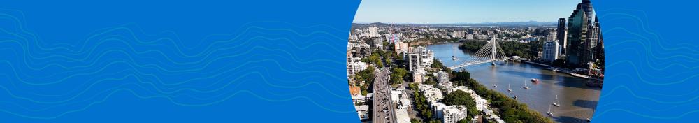 Section heading: 'Our Organisation'. Includes a decorative image of Brisbane skyline.