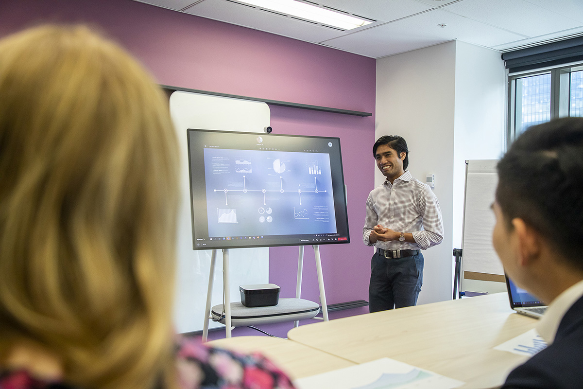person giving a presentation in office